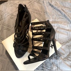 Beautiful strappy 6” pleaser heels. Brand new. Never used.